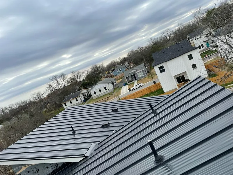 Standing seam metal roof panels with vents for Skylight Repair in Sidney